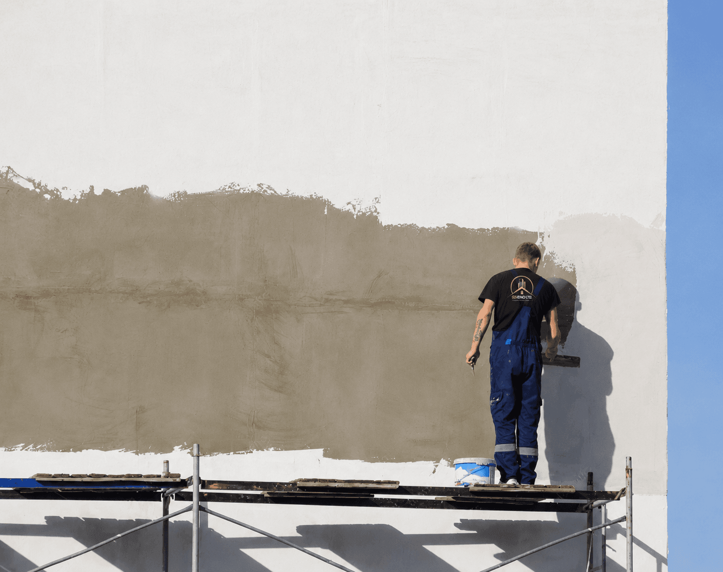 SS RENO LTD. crew preparing exterior walls and facade surfaces for finish work